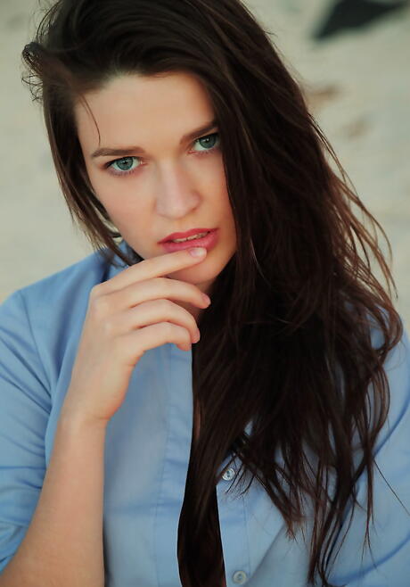 Excellent ukrainian dark-haired teen Serena Wood in panties exposes big boobs and shaved pussy at beach